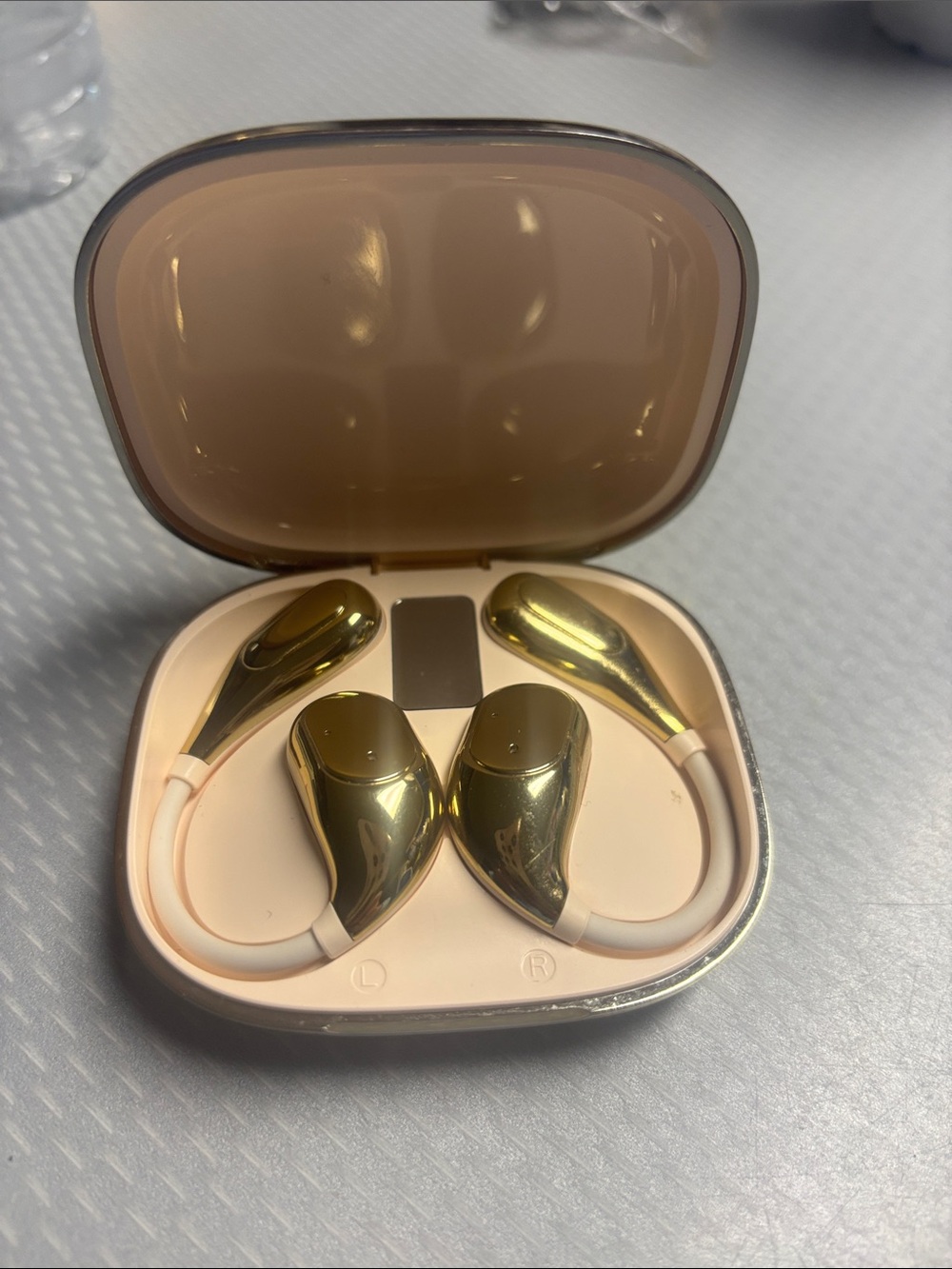 RCA Metallic Gold Fit pro earbuds